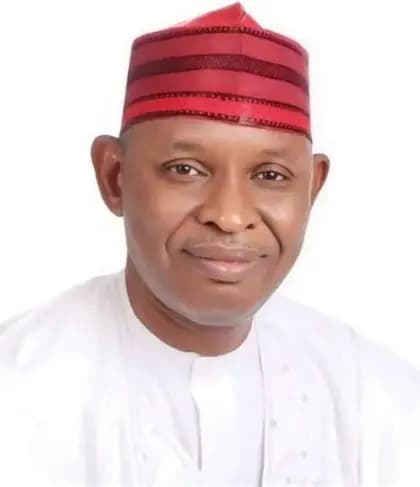 Portrait of a distinguished Nigerian man in traditional attire.